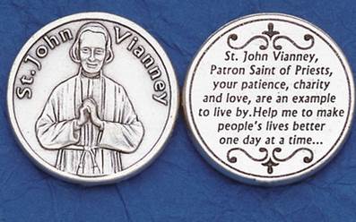 A coin depicting St Joh Vianney.